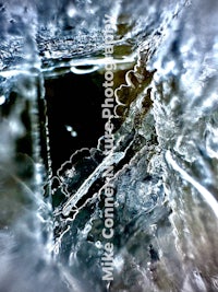 a close up image of ice and water