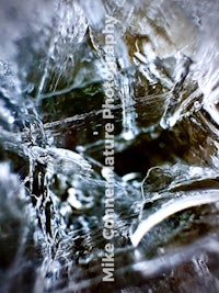 a close up image of ice and water