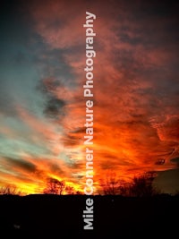 a photo of a sunset with the words mike photography